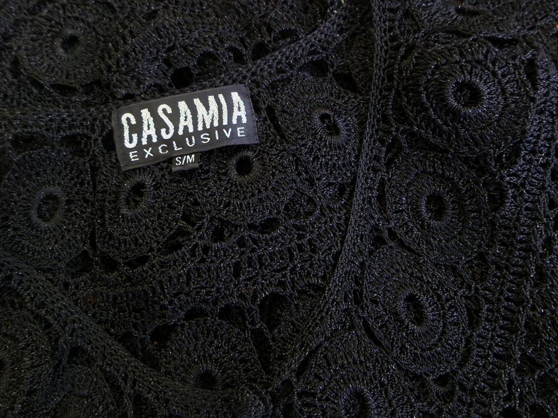 Casamia Exclusive Stl S/M Färg Svart Rund urringning Knäppt kofta Ärmlös Material Viskos 100% Öppet stickat