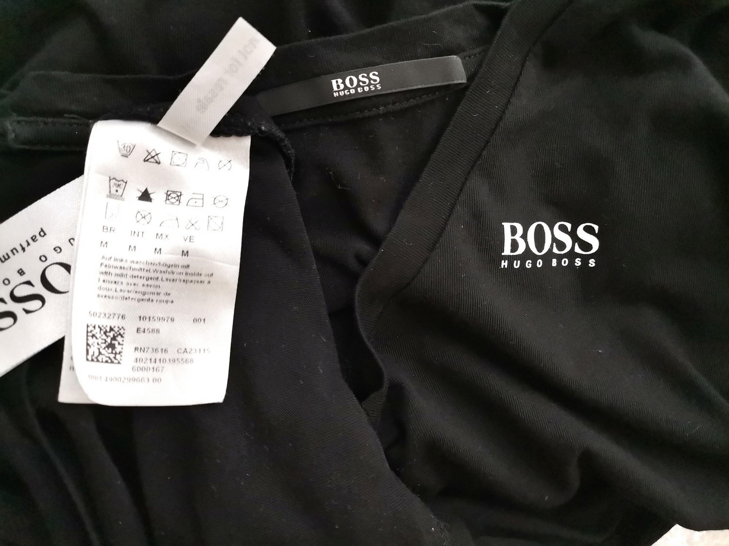 Hugo Boss Stl M Färg Svart V-ringning Kroppsnära Klänning ärm 3/4 Knälängd Material Modal