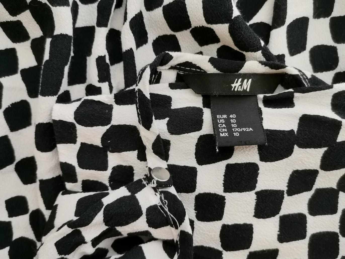 H&m Stl 40 Färg Vit Rutigt Rund urringning Blus Långärmad