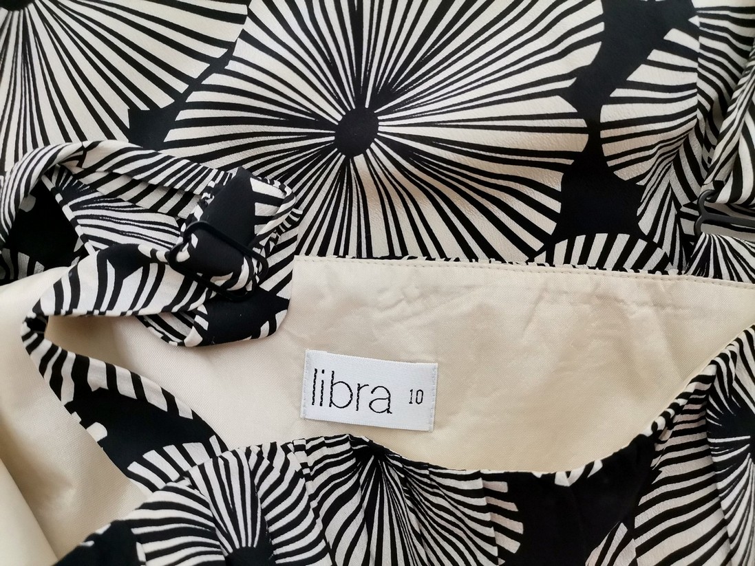 Libra Stl 10 (38) Färg Beige Axelbandslös Sommar Klänning Ärmlös Midi Material Siden 100%