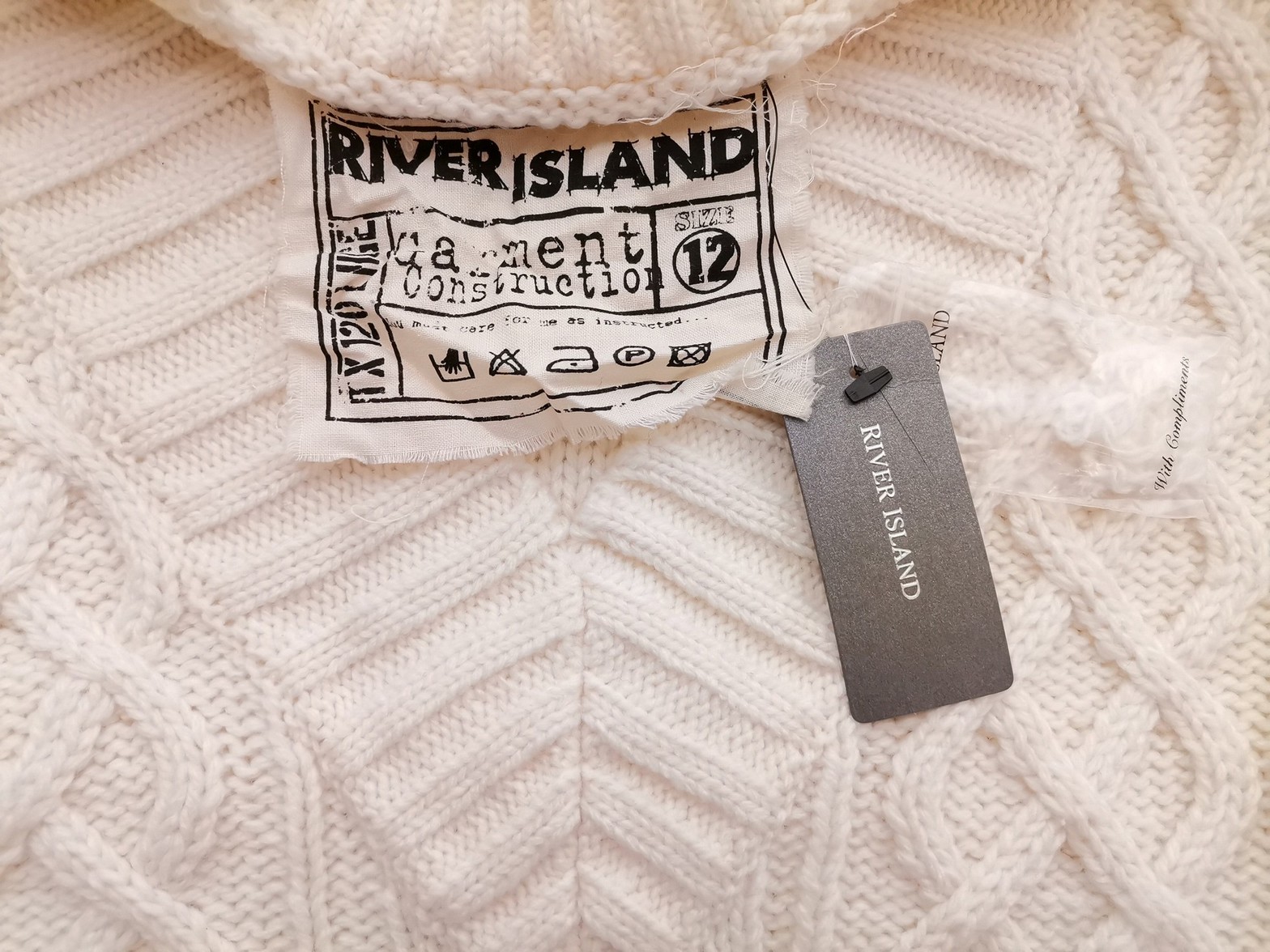 River island Stl 12 (38) Färg Elfenben V-ringning Stickad Tunika Blus Långärmad Material Akryl